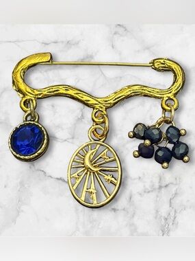 Gold-Tone Celestial Charm Brooch with Blue Crystal Accents